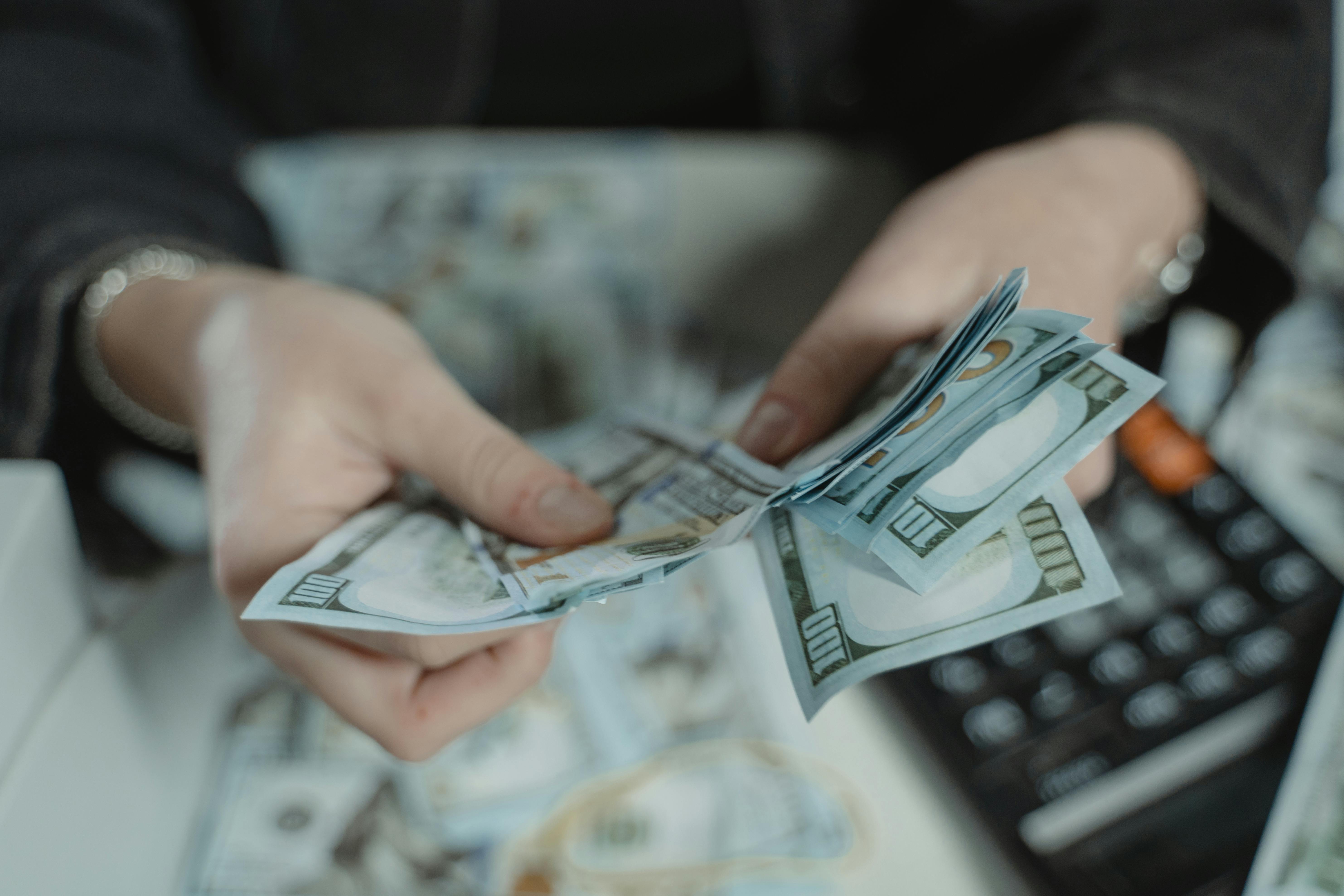 Landlord counting money for a down payment